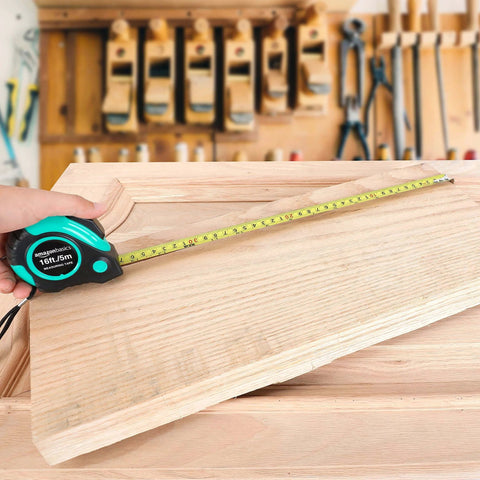 Hand measuring wood with tape measure from 104 Piece Home Repair Tool Set With Easy Carrying Pouch For DIY Projects And Everyday Fixes Includes Hammer Pliers Magnetic Screwdrivers And Bits Wrenches Utility Knife Level And More In A Turquoise Portable Kit.
