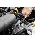 Using Durable 247-Piece Mechanic Tool Set With One Quarter, Three Eighths, And One Half Inch Drives on car engine, polished chrome finish