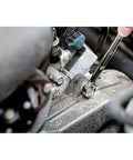 Mechanic using Durable 247-Piece Mechanic Tool Set With One Quarter, Three Eighths, And One Half Inch Drives, SAE sockets and ratchets