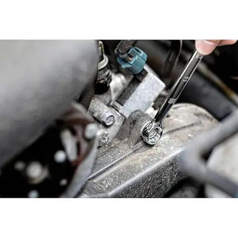 Mechanic using Durable 247-Piece Mechanic Tool Set With One Quarter, Three Eighths, And One Half Inch Drives, SAE sockets and ratchets