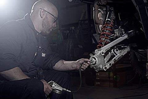 Person using 40mm Wheel Bearing Greaser Kit For Polaris ATVs UTVs And SxS Must Have Quick Grease Packer For Bearings Without Removing The Axle Or Suspension No Fuss Maintenance And Long Lasting Performance Tiger Tool on vehicle suspension.