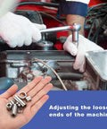 Hand holding 32-piece aluminum spacer set with 4mm ID, 7mm OD, and 4mm length, unthreaded standoffs for M4 screws near engine work