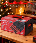 132-Piece Mechanics Tool Set box on workbench, SAE/Metric 1/4" & 3/8" Drive Socket Set, holiday-themed background