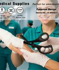 Medical professional using 2 Pack Medical Trauma Shears For Left And Right Hand With Patented Bandage Scissors to cut bandage.
