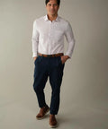 Man wearing Cloudlike 4 Way Stretch Slim Fit White Dress Shirt For Men That Moves With You From Desk To Dinner Wrinkle Free Size Large