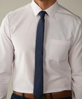 Man wearing Cloudlike 4 Way Stretch Slim Fit White Dress Shirt For Men That Moves With You From Desk To Dinner Wrinkle Free Size Large