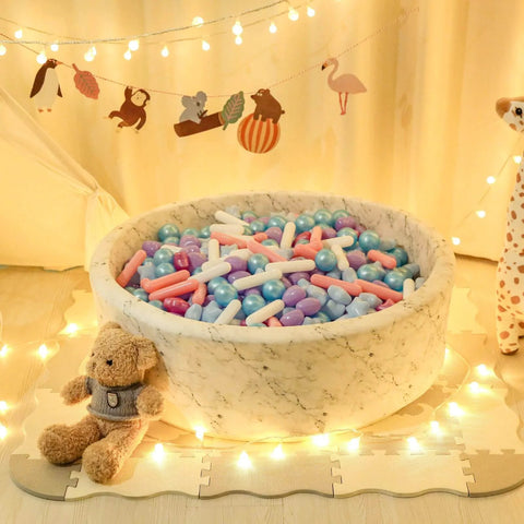 Ball Pit Balls - Pack of 200pcs Crush Proof Plastic Children's Toy Balls in mermaid colors inside a white marble-patterned pit.