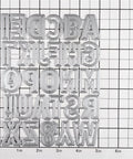 English Alphabet 26 Letter Metal Cutting Dies Set For Card Making And Scrapbooking Embossing Die Cuts on grid background