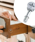Effortless knockdown furniture assembly with a 10 pack of metal cam lock fittings and dowels in use on wooden drawer
