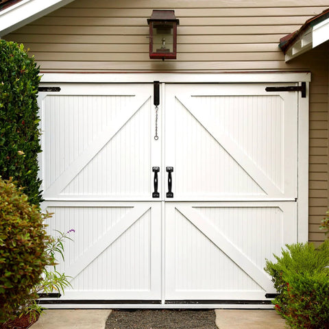 White double garage doors with Two Pack 5.5 Inch Metal Door Handles Heavy Duty Modern Hardware, matte black finish, exterior use.