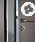 Side view of metal door with handle and lock featuring installed 200 Piece Rubber Door Silencer Pack For Metal Doors, Built To Last.