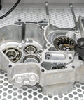 Coarse aluminum oxide blasting media used on metal machinery parts for fast, durable surface prep