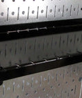 Wall Control Pegboard Organizer 4 ft. Metal Pegboard Standard Tool Storage Kit with Galvanized Toolboard and Black Accessories shelf close-up