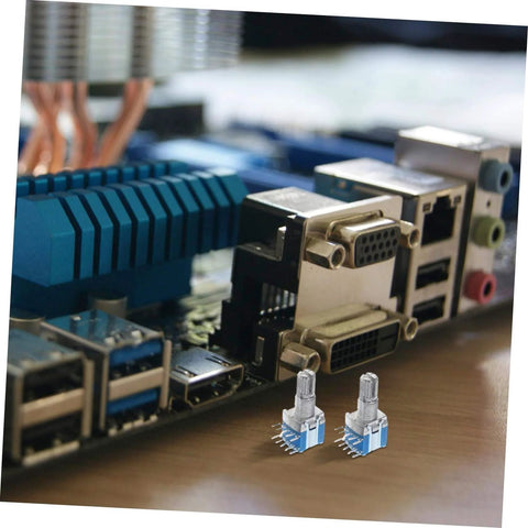 Close-up of two metal rotary encoder switches from a five pack on a motherboard. Five Pack Metal Rotary Encoder Multi Position Switch For Accurate Control In Industrial Machinery And Home Appliances With Rugged Construction And Digital Potentiometers For Digital Precision And Long Term Stability