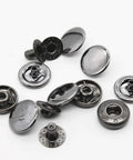 Leather Snap Fasteners Kit 12 Set 15mm Metal Snaps With Four Install Tools Rivets And Snaps For Clothing Jeans Jackets Bracelets And Bags Silver Raydodo For All Your Gear, showing loose metal snaps.
