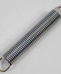 Close-up of a metal spring with loops on each end, displayed on a neutral background.