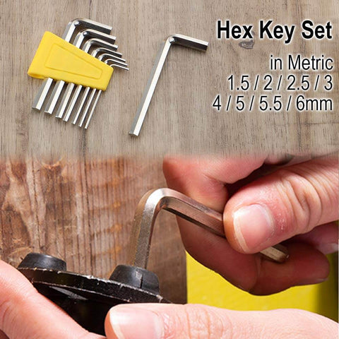 Hex key set in metric sizes 1.5 to 6mm shown with hand using a key for tightening on wooden surface