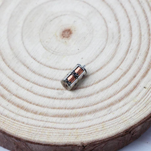 10Pcs DC 5V 2-Phase 4-Wire Micro Mini Ultra-Tiny 4 mm Precision Stepper Motor DIY shown on wooden surface