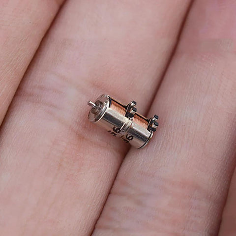 10Pcs DC 5V 2-Phase 4-Wire Micro Mini Ultra-Tiny 4 mm Precision Stepper Motor DIY shown on a fingertip