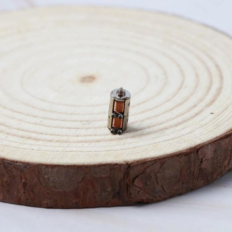 10Pcs DC 5V 2-Phase 4-Wire Micro Mini Ultra-Tiny 4 mm Precision Stepper Motor DIY on wooden surface