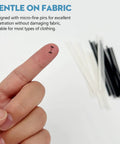 Close-up of 2000 PCS Micro Stitch Gun Fasteners Kit 0.18 Inch Extra Fine Tagging Fasteners in white and black, with a finger showing size.
