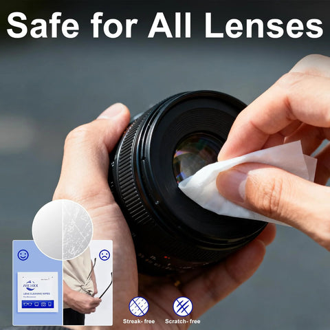 Person using Individually Wrapped Microfiber Lens Wipes For Glasses Sunglasses And Cameras to clean a camera lens.