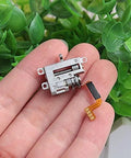 Close-up of a 2-Pack Mini 5mm 2-Phase 4-Wire 3V 5V Planetary Gear Stepper Motor Linear Screw Slider on a hand.