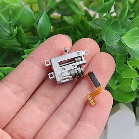 Close-up of a 2-Pack Mini 5mm 2-Phase 4-Wire 3V 5V Planetary Gear Stepper Motor Linear Screw Slider on a hand.