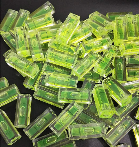 Pile of Six Piece Mini Bubble Level Set For Alignment And Picture Hanging In DIY Craft Projects Acrylic 10x10x29mm Yellow Green With Black Lines