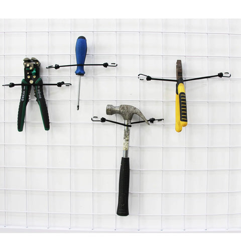 Assorted Mini Bungee Cords With Hooks 18 Piece Set securing tools to a grid panel, showing various sizes and uses for organizing.