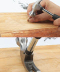 Compact Mini Claw Hammer With Rubber Handle Handy Lightweight Hand Tool For Home Repairs Carpet And Wall Nail Remover shown in use