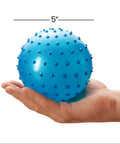 Person holding a 5-inch blue Mini Knobby Ball from the Pack of 12 Bulk Sensory Balls and Spiky Massage Stress Balls with Pump.