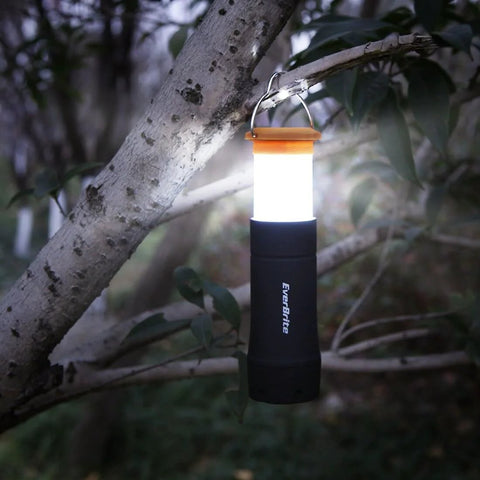 2 In 1 Mini Lanterns And Flashlights With 3 Modes And Zoomable LED Beams hanging on tree branch at night