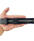 Person holding Linear Rail 100mm Linear Stage Actuator with Square Linear Rails Mini Slide Table + NEMA 11 Stepper Motor