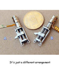 Two Mini Micro 4mm 5V 2-Phase 4-Wire Precision Planetary Gearbox Gear Stepper Motors with metal slider nut next to a coin for scale