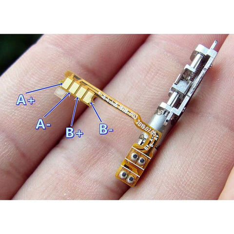 Close-up of Mini Micro 4mm 5V 2-Phase 4-Wire Precision Planetary Gearbox Gear Stepper Motor Screw Metal Slider Nut on hand