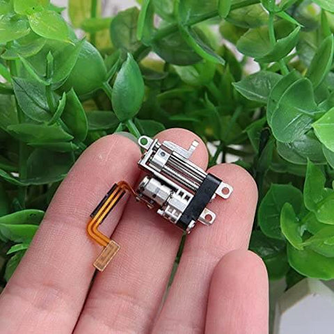 Close-up view of a 2-Pack Mini 5mm 2-Phase 4-Wire 3V 5V Planetary Gear Stepper Motor Linear Screw Slider held on fingertips.