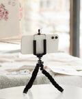 Smartphone on flexible tripod using 2 Pack Mini Ball Heads With One Quarter Inch Mounting Screw, 360 Degree Horizontal Rotation And 90 Degree Tilt.