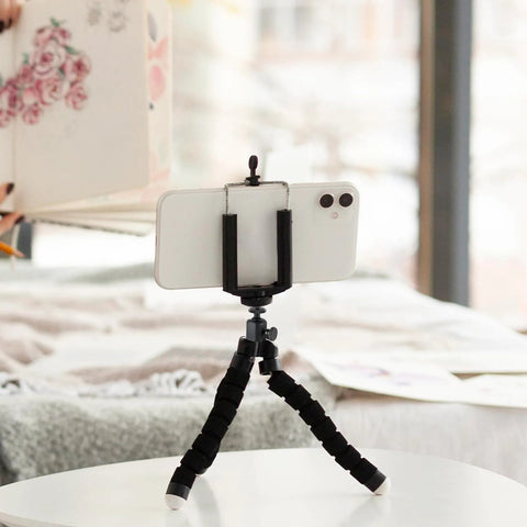 Smartphone on flexible tripod using 2 Pack Mini Ball Heads With One Quarter Inch Mounting Screw, 360 Degree Horizontal Rotation And 90 Degree Tilt.