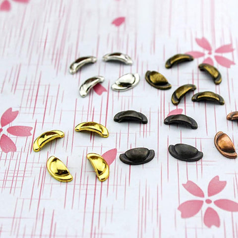 Assorted Thirty Pcs Miniature Alloy Knobs For Dollhouse Cabinets And Drawers One Twelfth Scale Tiny Drawer Pulls on floral paper