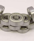 10-Pack Bearings 1603ZZ 5/16" x 7/8" x 9/32" - Miniature Bearings stacked on display