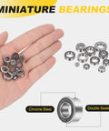 4 Pieces SMR63-2RS Deep Groove Ball Bearings 3x6x2.5mm shown on hand, double shielded, for miniature motors and precision projects.