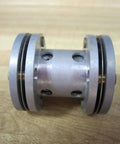 Side view of Miniature Flexible Disc Coupling CC37 One And A Half Inch By One And Seven Sixteenth Inch Diameter For Small Shaft Motors And Gearboxes Precision High Torque Low Backlash Durable Compact Rexnord 017225 made of metal with visible disc holes, engineered for torque transmission in limited spaces.