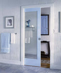 Soft Close Pocket Door Frame Kit for 2x4 Stud Walls 32x80 Inches installed in a bathroom setting with white walls and towel holder