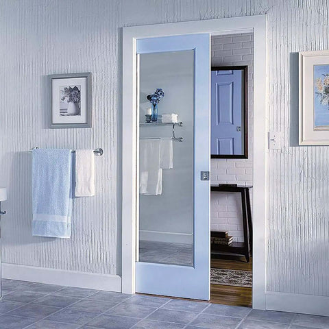 Soft Close Pocket Door Frame Kit for 2x4 Stud Walls 32x80 Inches installed in a bathroom setting with white walls and towel holder