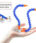 Mist Coolant Lubrication Spray System For Metal Cutting with flexible pipe and magnetic base shown on a hand, vibrant color design