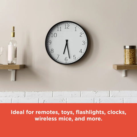 Analog wall clock on shelf, highlighting use for Mixed Alkaline Battery Pack 12 AA 12 AAA With Reusable Plastic Case.