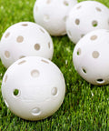 Plastic Baseballs - MLB - Includes 8 Balls for Batting Practice or Backyard Baseball Play - Replacement Balls – 70mm Official Baseball Size - White, close-up on grass