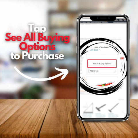 Smartphone displaying 'See All Buying Options' button with instruction to tap for purchase on a wooden table background.