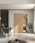 Concealed Barn Door Hardware Kit with Soft Close Mechanism and Invisible Wall Mount Aluminum Track installed in modern living room.